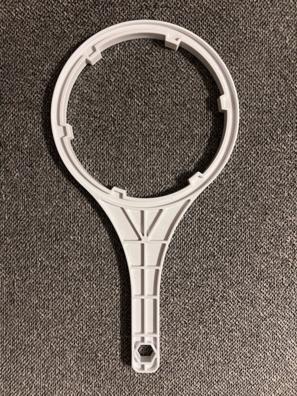 White Plastic Filter Wrench Tool - Fits Whirlpool 10” filter housing.